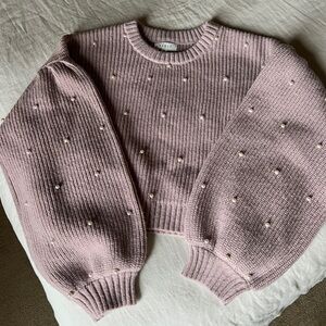 Adorable pink sweater with pearl detail